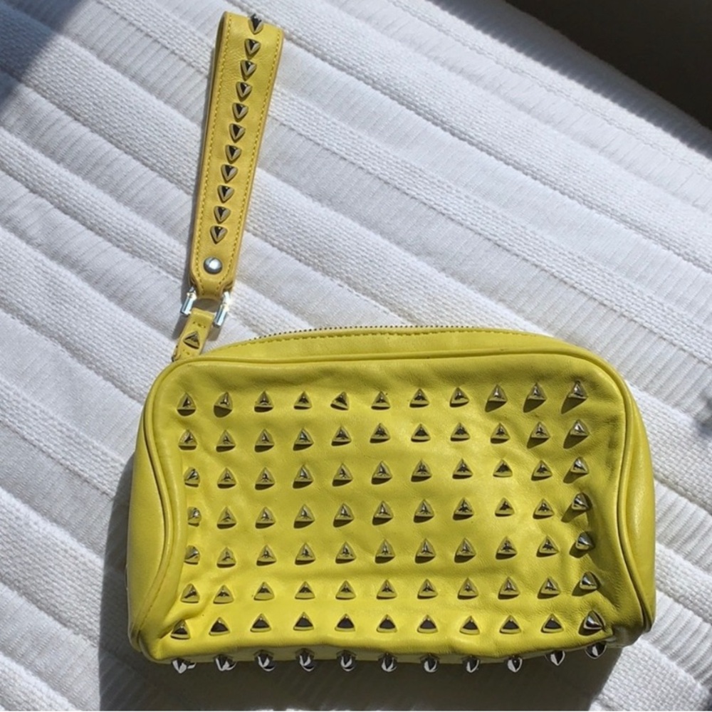 Tory Burch leather studded clutch bag.